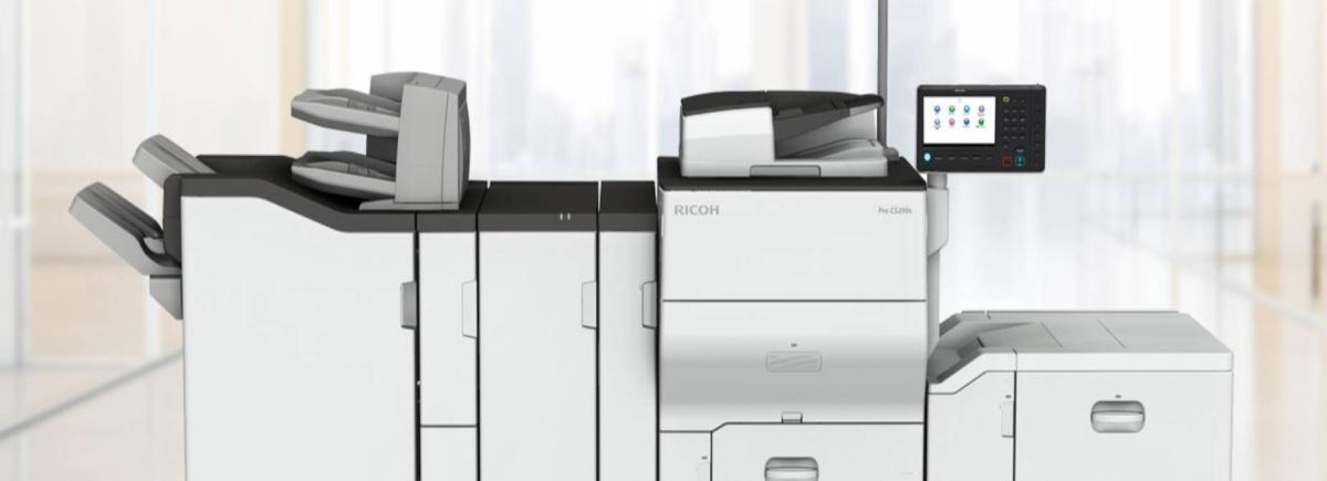 Ricoh Large Format Printer in a large open workspace